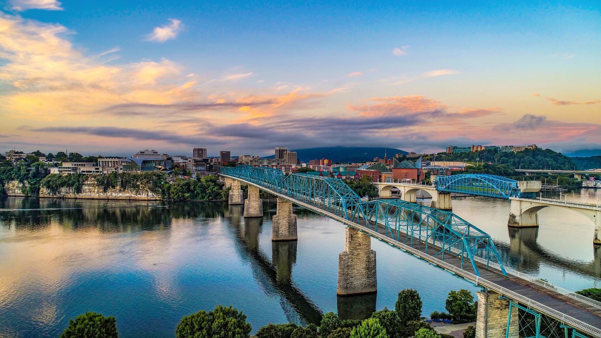 Chattanooga Tennessee skyline with iconic blue bridge over Tennessee River